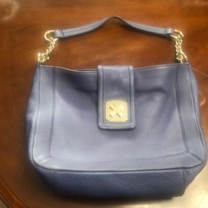 Purple Calvin Klein shoulder bag.